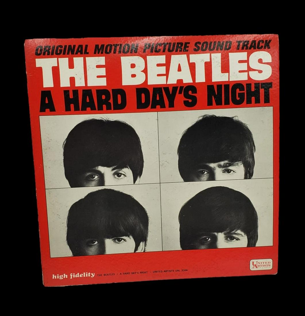 The Beatles A Hard Days Night RED Cover 1ST Pressing; UAL 33 66 1964 High Fidelity Recording: The Beatles A Hard Days Night RED Cover 1ST Pressing: UAL 33 66 is the third studio album by the English rock band the Beatles, released on 10 July 1964 by Parlophone, with side one containing songs f
