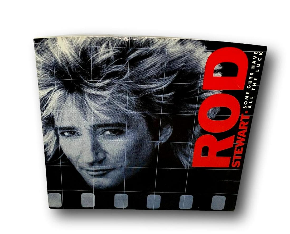 Some Guys Have All The Luck by Rod Stewart 45 Record-: â€œSome Guys Have All The Luck” by Rod Stewart 45 record. 1984 WEA Records. Kept in the original jacket sleeve. 7-29215 Cond: Very good condition. Minor staining on jacket sleeve noted. Co