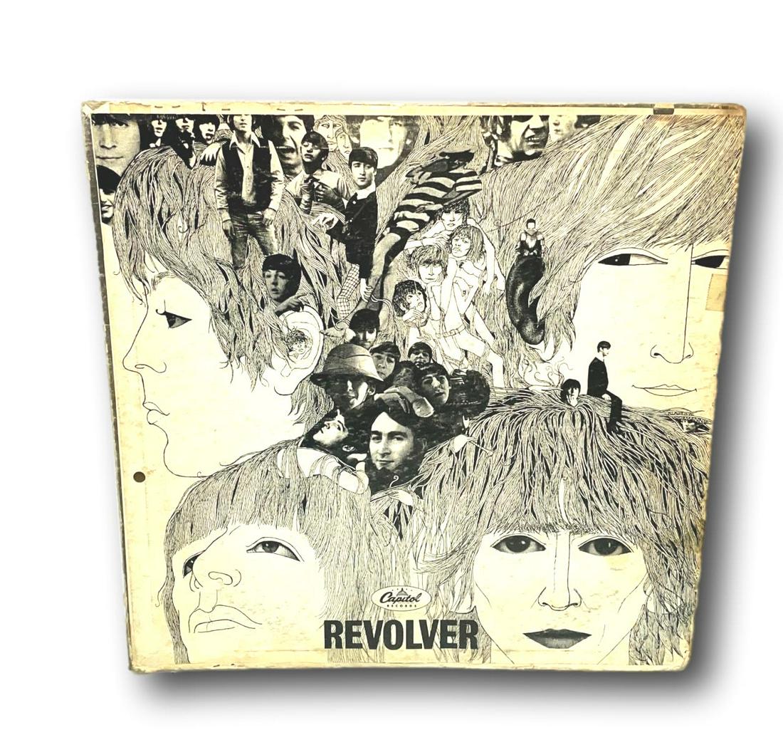 Revolver 1968: The Beatles LP Record-ST-2576.: â€œRevolver” 1968: The Beatles LP record. Capitol Records. Recorded in England. Kept in the original sleeve and jacket. ST-2576. Cond: Fair condition with signs of wear. Some staining noted 