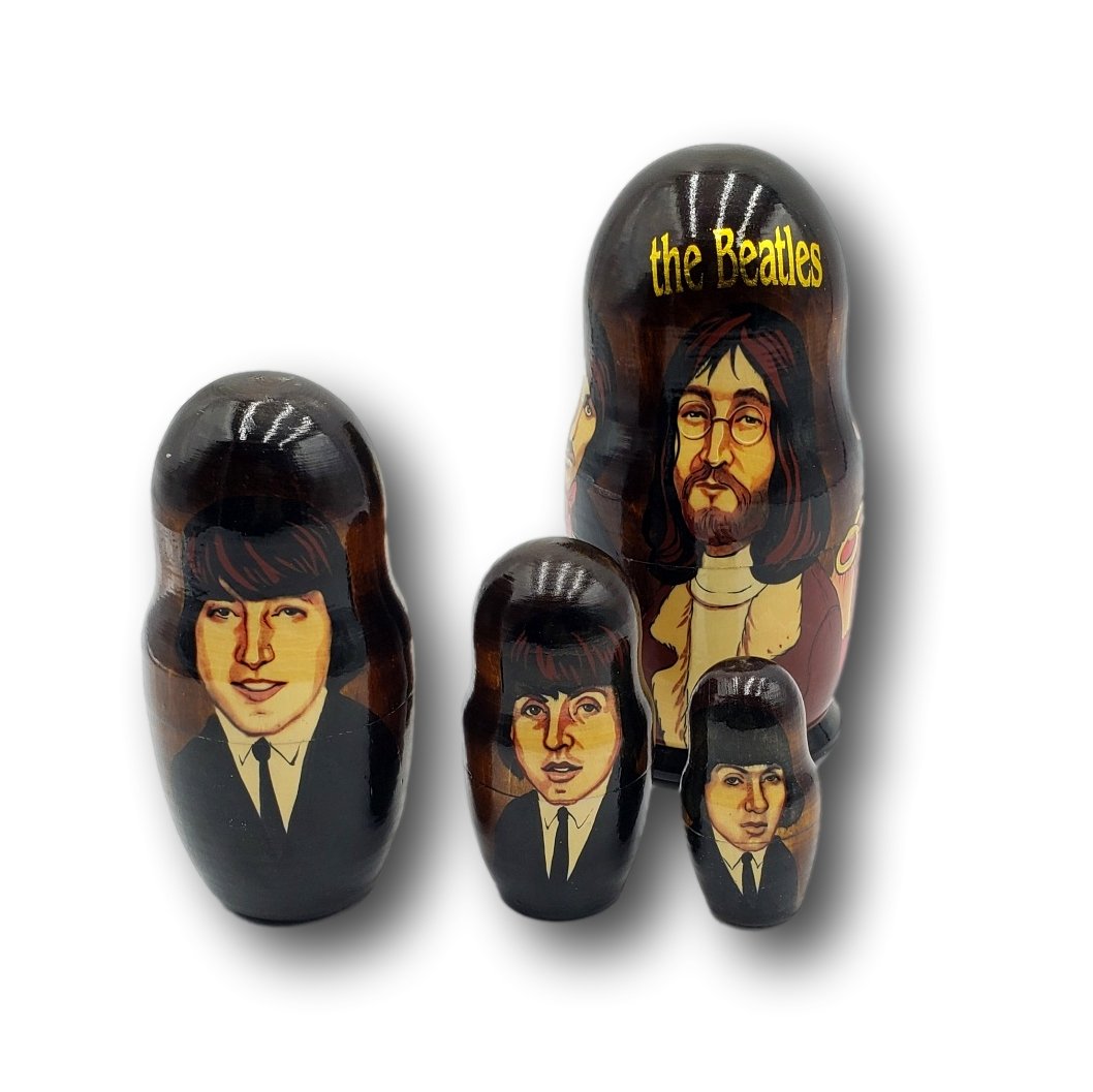 The Beatles Nesting Dolls Matryoshka: Figurines of all four members of The Fab Four. 4 hand-painted and lacquered canisters, each with images of The Beatles through the years that can be opened at the mid-point so that one fits inside the
