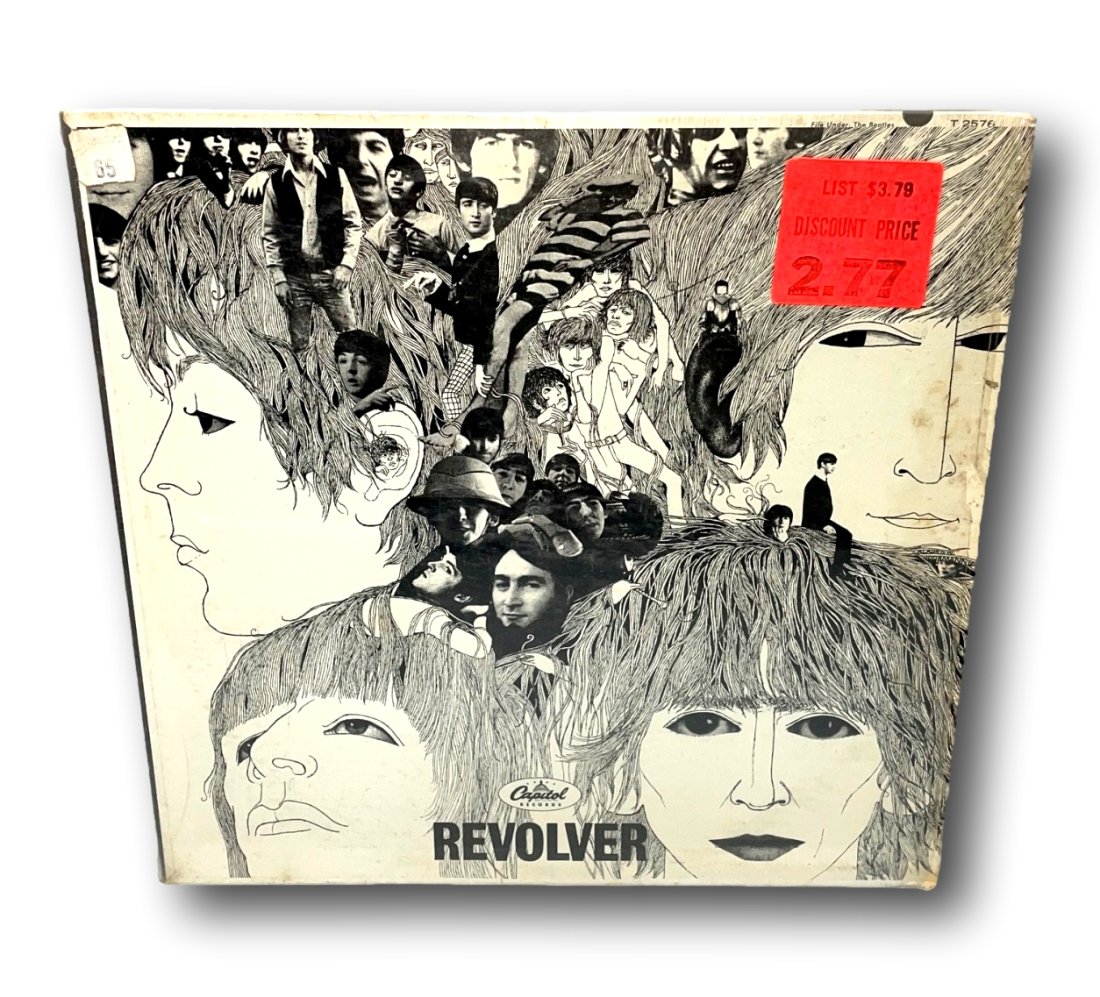Revolver by The Beatles LP Record 1966 Mono. T-2576: Revolver by The Beatles LP record. Capitol Records. Kept in the original sleeve and jacket. Mono. T-2576. Cond: Good condition with signs of normal wear. Foxing and some staining noted on the jacket. 