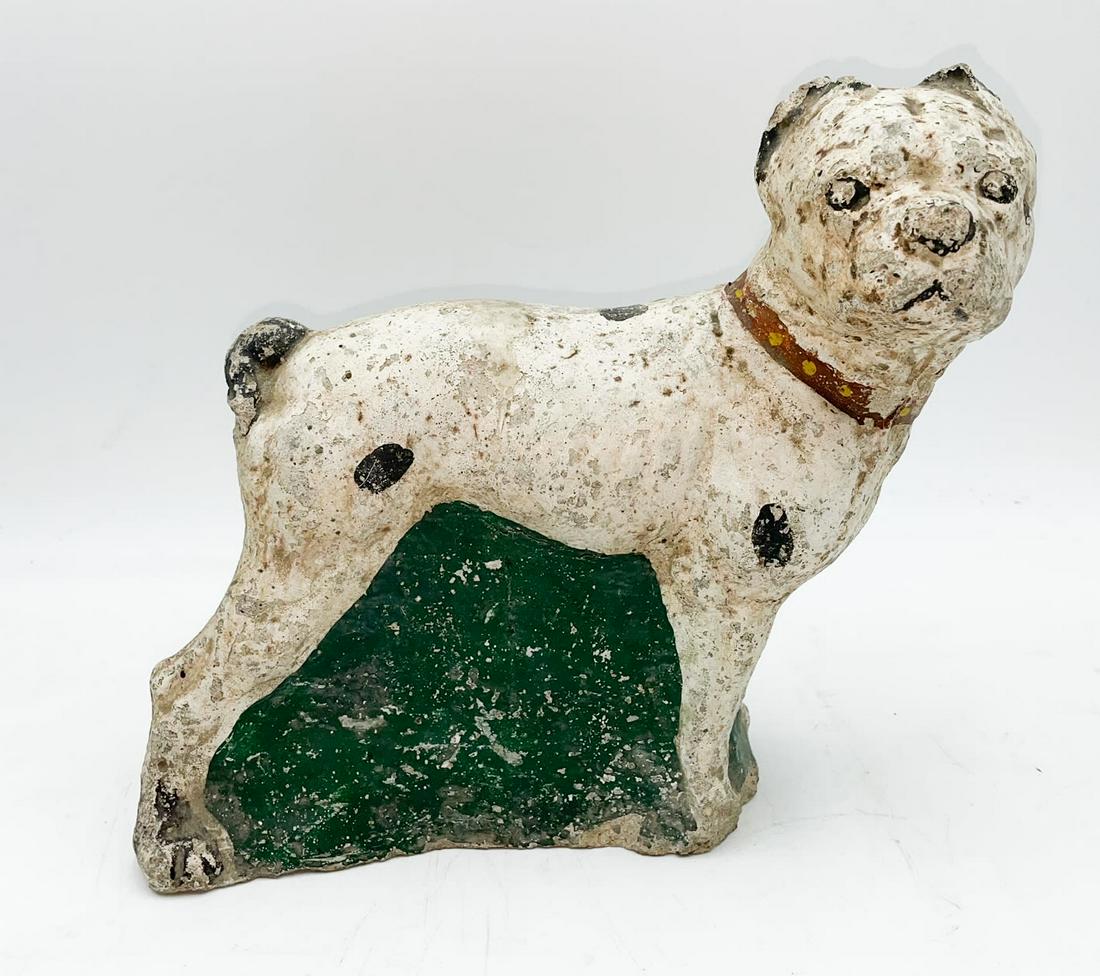 Antique Spotted Dog Door Stopper: Antique cement door stopper of black and white spotted dog in alert stance. Size: H- 9 inches W- 9 inches. Cond: heavy paint chipping, discoloration noted. Portions of both front paws, end of the tail