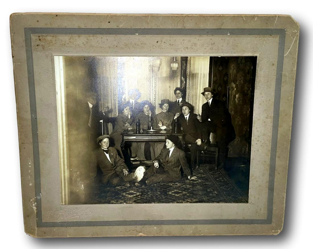 Early 1900s Suffragettes Photograph: Matted black and white photograph of Indiana U.S. Suffrage Party circa 1910-1915. Cond: Staining and edge/corner wear. The bottom left corner of the frame has 2-inch crease line leading to a tear. Siz