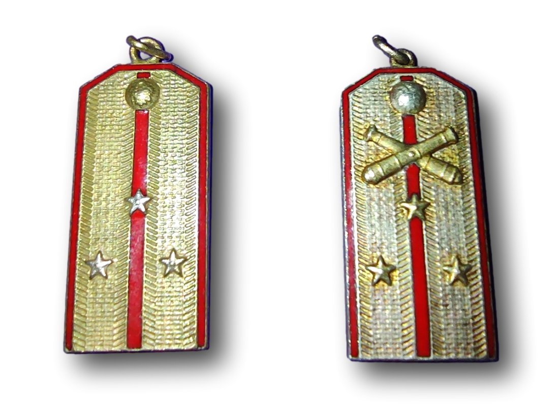 Imperial Russian Jeton -Mini Epaulette - in Red and Gold: 2: Imperial Russian Jeton -Mini Epaulette - in Red and Gold: Two pendants of enamel over brass: one with 3 stars and the other with crossed cannon and three stars. Please refer to the images for the best