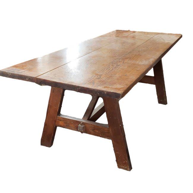 Large Oak Country Farm Trestle Table: This hand-made table features three 11-inch planks which make up the top. The top has some varnish loss on the top as noted in the images. The table measures 85 inches long, and 33 inches wide, and st