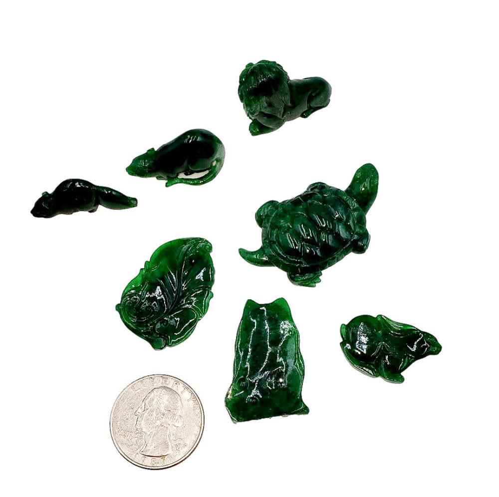 Dark Jade Animal, Insect, Miniature Carvings: Very dark-colored Jade, possibly Imperial, miniature carvings of a cat, lion, squirrel, turtle, scorpion, mouse or rat, and rabbit. All 7 pieces are graded Very Fine. Sizes range from 1 inch to 1.5 in
