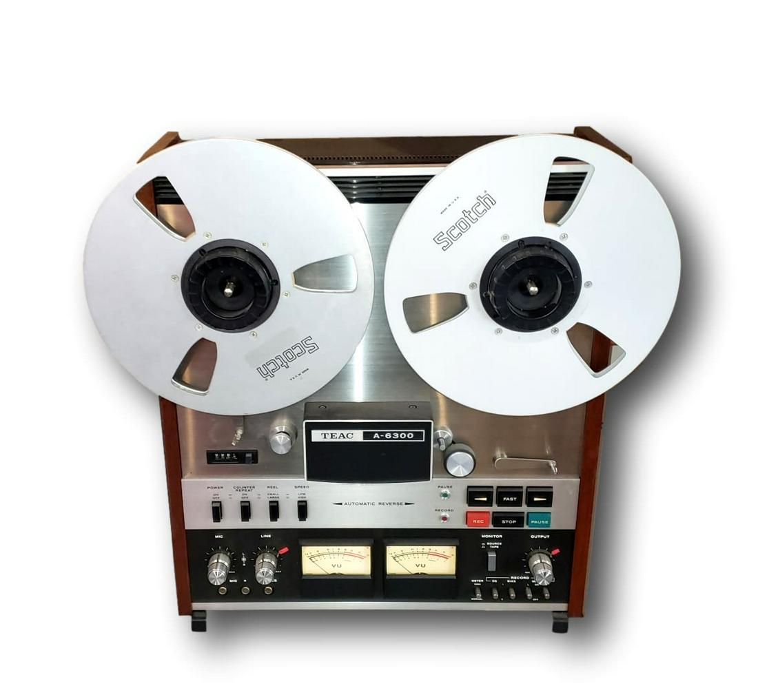 Teac A-6300 Reel to Reel Tape Deck: Teac A-6300 with Auto Reverse. This machine is in great condition. It was recently serviced. All the knobs, buttons, ports, and lights work. Track system: 4-track, 2-channel, stereo/monaural systemHea