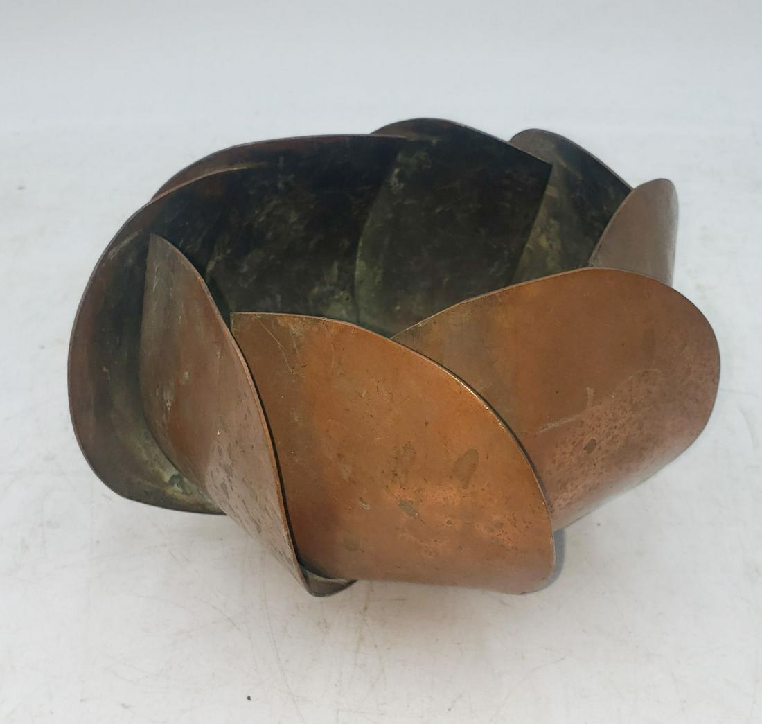 Copper Open Leaf Bowl by Francisco Rebajes (1906-1990): Francisco Rebajes (1906-1990) noted open-leaf copper bowl is signed, measures approximately 7 inches in diameter, and stands 4 1/2 inches tall. We review every item to determine its basic condit