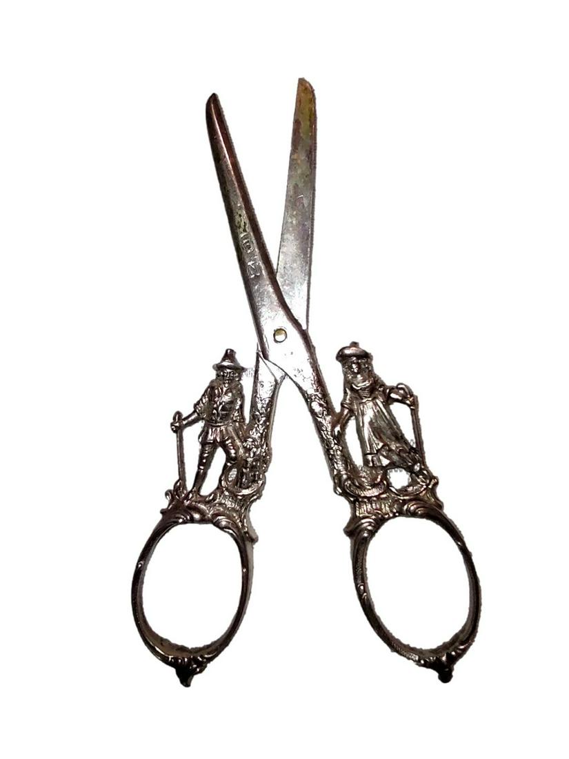 Antique Sterling Embroidery Scissors: French18thC: Antique Sterling Silver Embroidery Scissors: French Romanticism.Figural embroidery scissors in the Romantic style of the late 18th to the mid-19th century. Hallmarks on both blades are well-worn and b