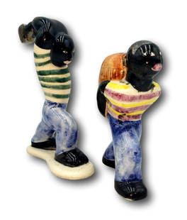 Vintage Shearwater Pottery Black Worker Figurines: Each standing approximately 4 1/2 inches tall these pieces are in very fine condition with no cracks, chips, or repairs.&nbsp; Color is vibrant.&nbsp; Both pieces are signed on the bottom.&nbsp; â€