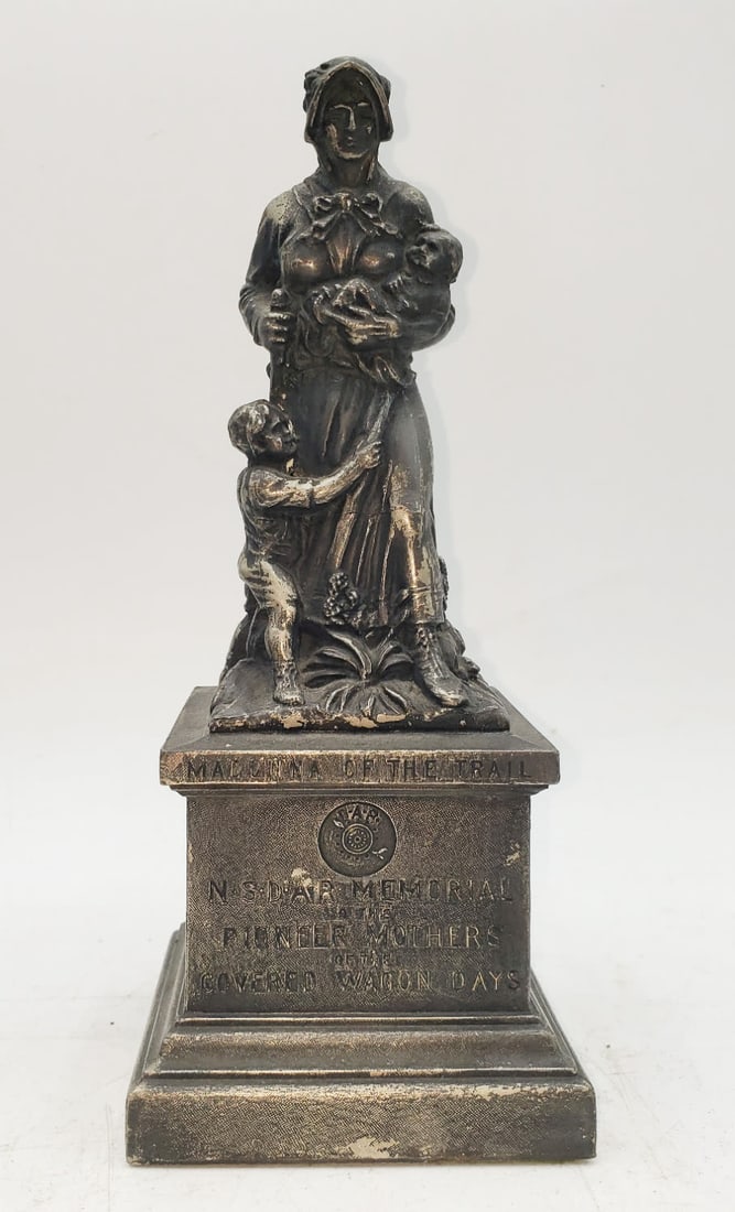 Madonna of the Trail N S D A R Memorial to the Pioneer Mothers of the Covered Wagon Days Souvenir: National Society Daughters of the American Revolution (NSDAR) detailed metal souvenir of The Madonna of the Trail which is a pioneer woman clasping her baby, with her young son clinging to her skirts.