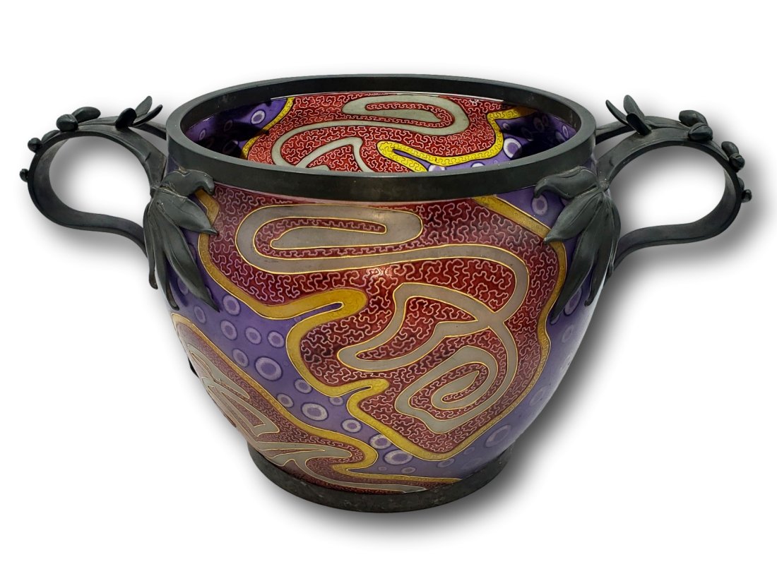 Exquisite Art Nouveau Glass Vessel with Ornate Metal Leaf Handles: This stunning Art Nouveau glass vessel is an exemplary showcase of the period's celebrated design ethos. The piece boasts an alluring blend of aesthetic charm and masterful craftsmanship. Adorned with