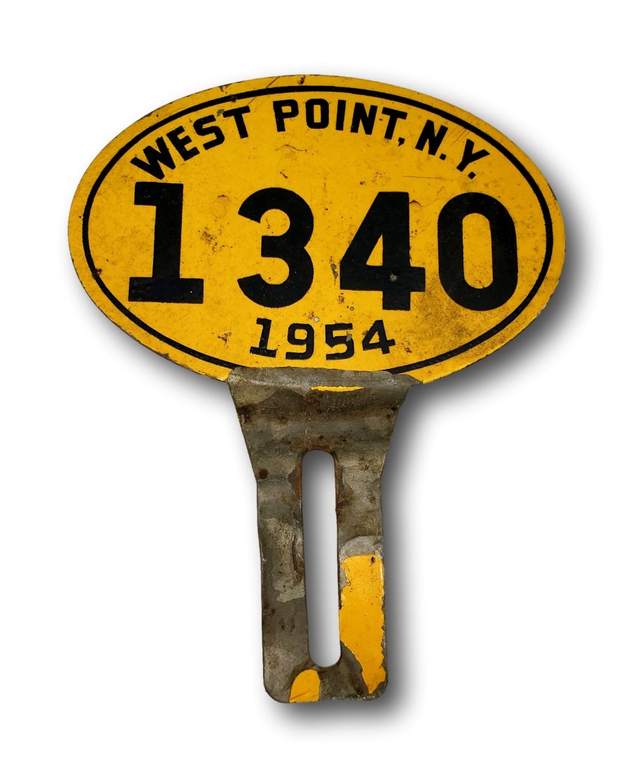 1954 West Point, N.Y. Military Base License Plate Topper: This genuine 1954 license plate topper hails from the historic West Point Military Academy in New York, offering a unique piece of Americana. In good original condition, this iconic yellow and black a