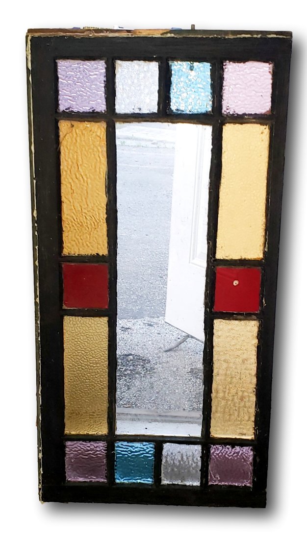 Stained Panel Window: Panels are textured plastic. There are no cracks. Measurements 19 by 38 by 1 1/4 inches.