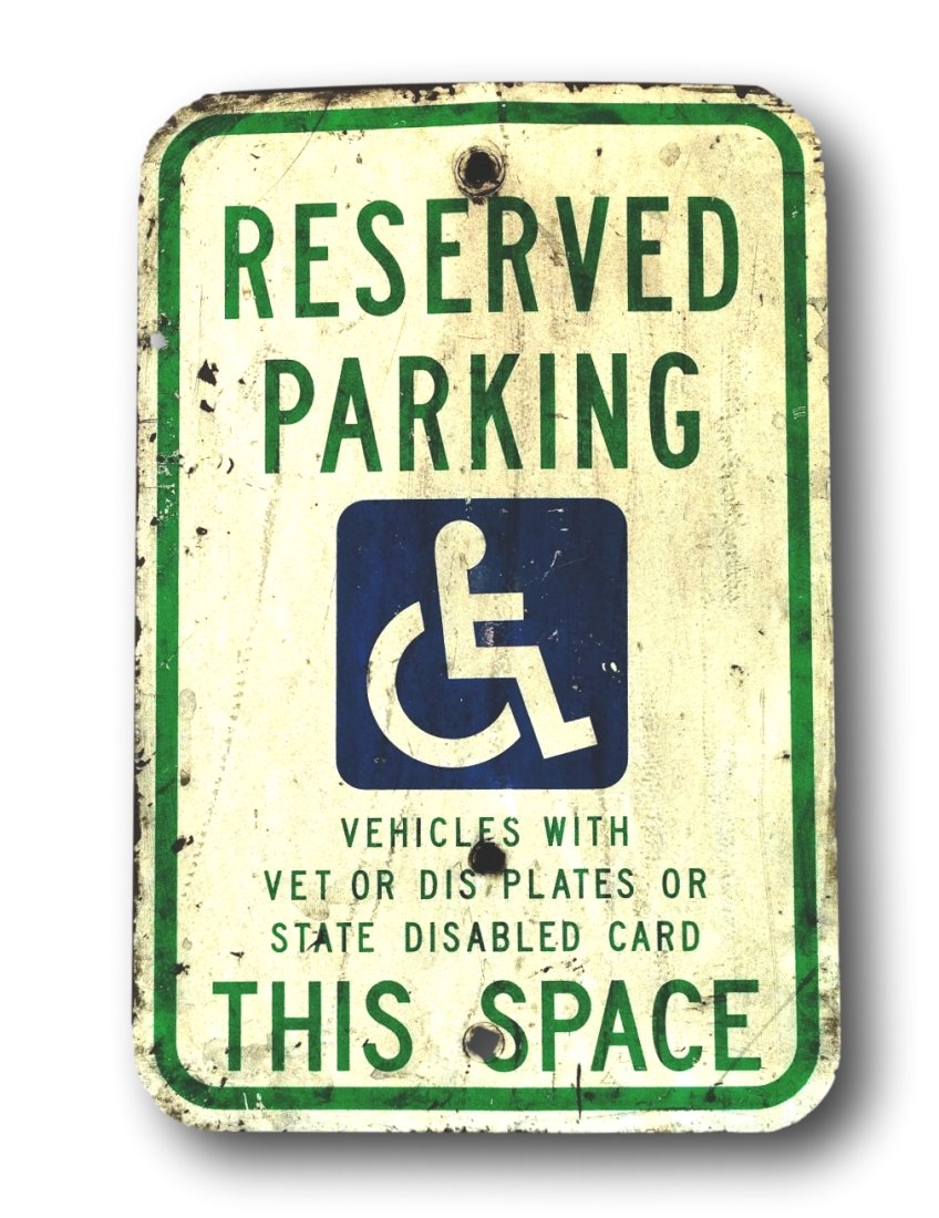 Vet and Disabled Parking Sign: Reflective paint on steel handicapped parking sign for veterans plates and disabled people with permits. 12 x 18 inches. Fair to good condition. Used, vintage sign from before the center symbol change