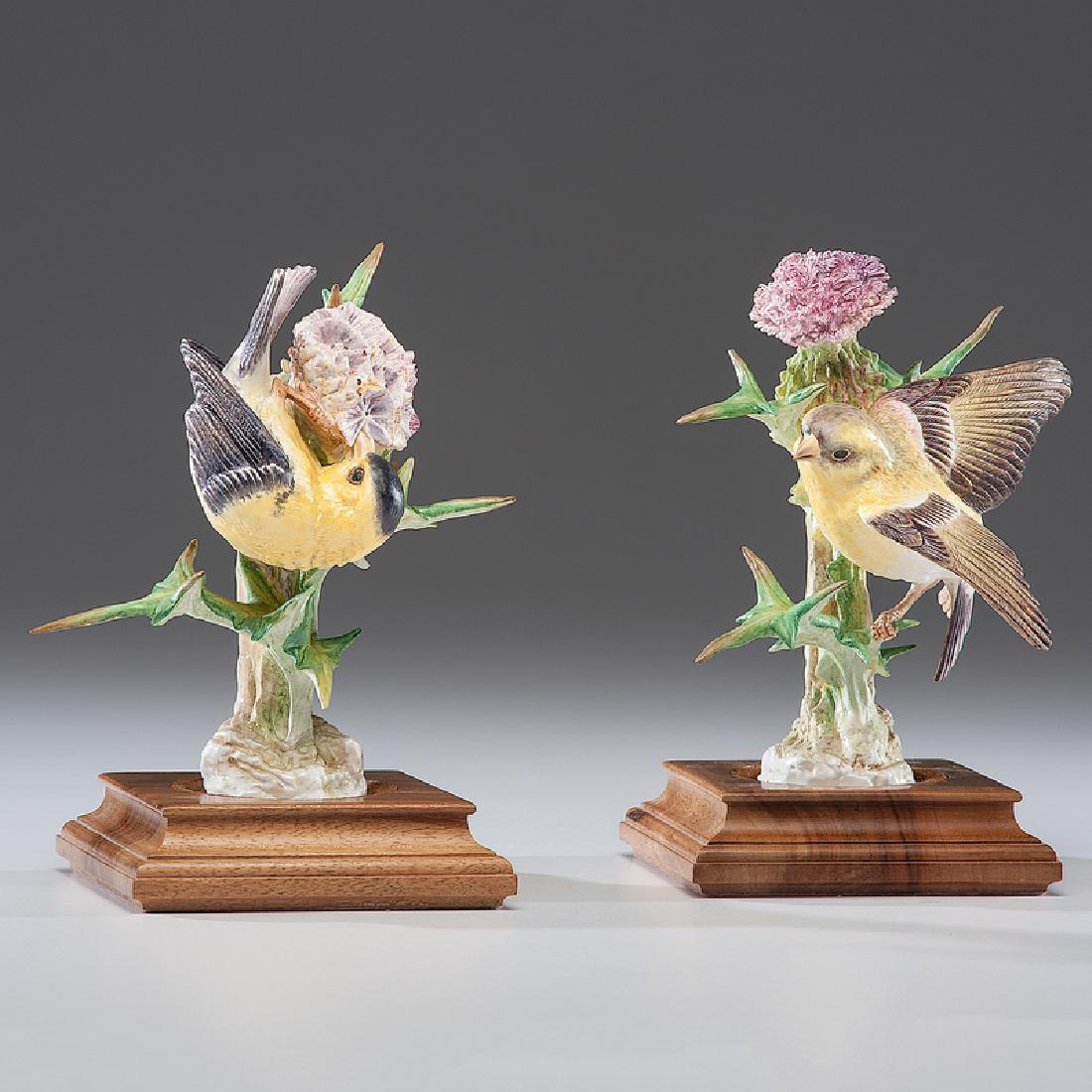 Royal Worcester Dorothy Doughty Gold Finches: English, first half 20th century. A pair of porcelain gold finches, male and female, perched on thistle branches, modeled by Dorothy Doughty (1892-1962) for her American Birds series, and produce