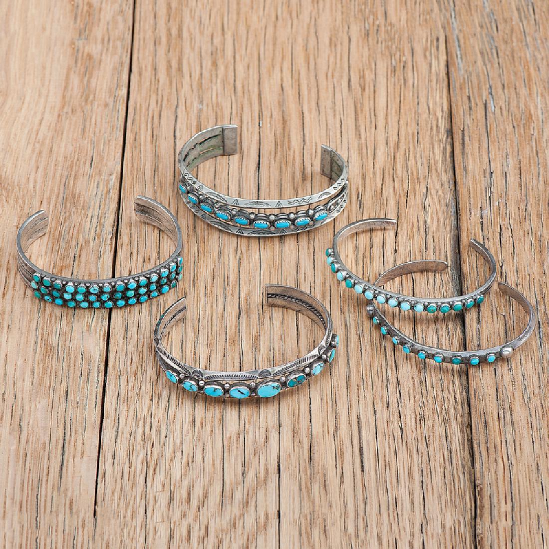 Zuni Needle Point Turquoise and Silver Cuff Bracelets: lot of 5, includes silver bracelets with rows of needle point set turquoise; sizes: interior circumference 6 in. x gap length 1.25 in., interior circumference 6.5 in. x gap length 1.25 in., interior