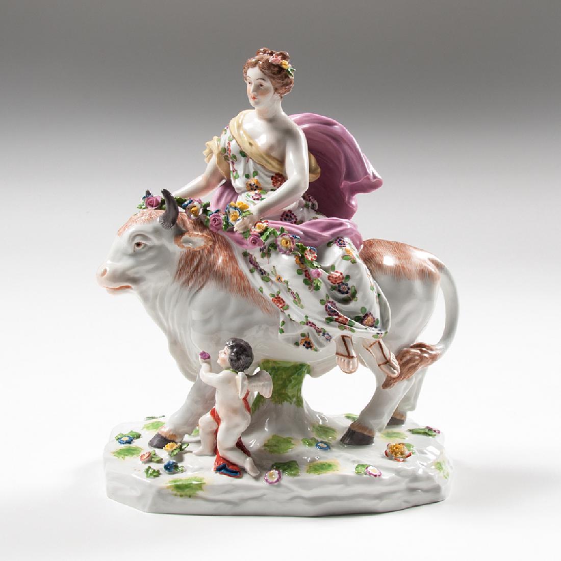 Capodimonte "Europa and the Bull" Figural Group: Italy, mid-19th century. A porcelain figural group by Capodimonte in the form of "Europa and the Bull" from Greek mythology, featuring Europa seated on the bull's back with a garland of flowers and