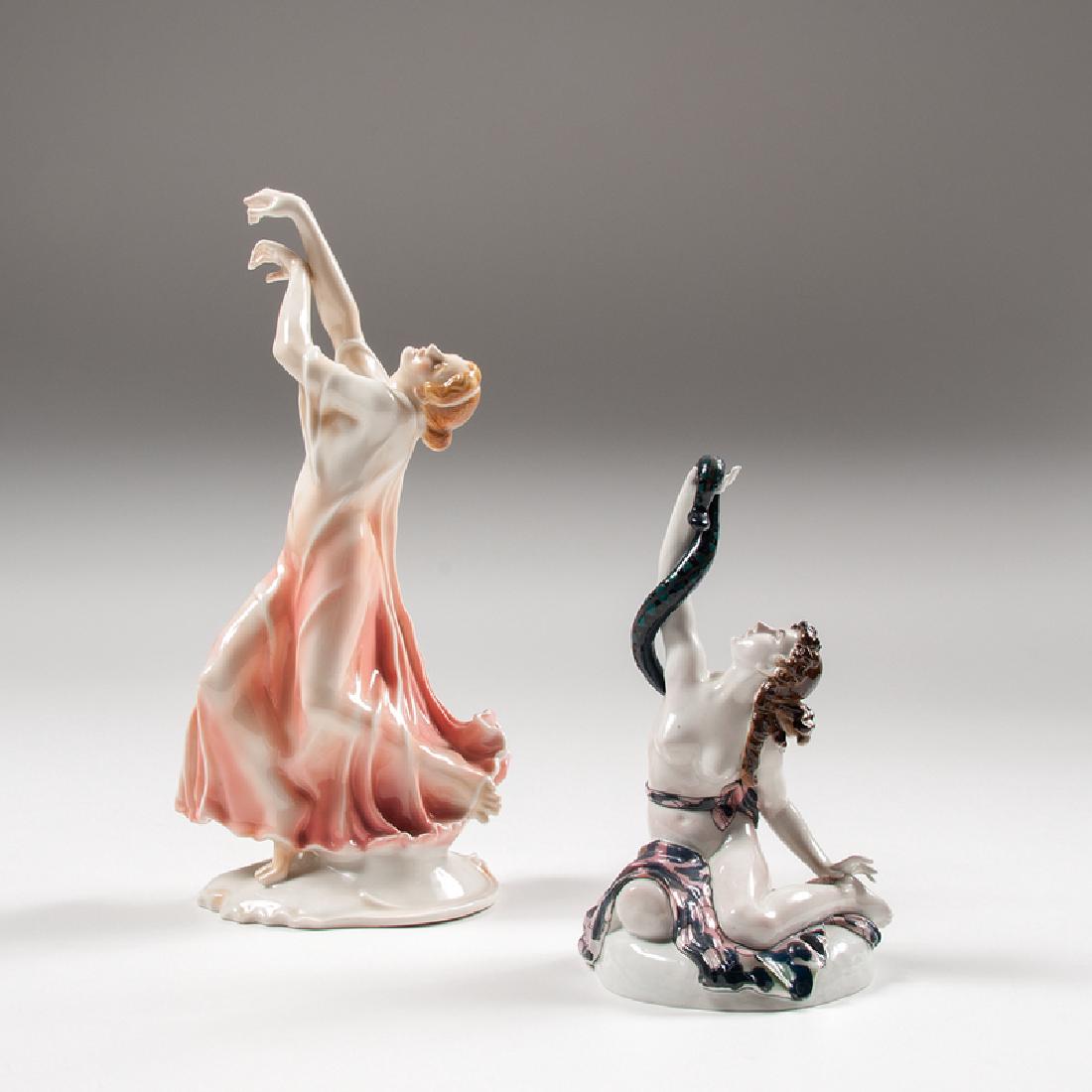 Karl Ens Porcelain Dancers, Lot of Two: Germany, early 20th century. A group of two porcelain figures by Karl Ens, each with manufacturer's mark on underside, including one of a semi-nude dancer seated with a snake wrapped around one arm, i