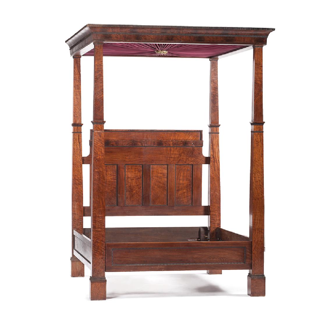 American Four Poster Bed with Tester Top: American, ca 1850. A four post tester canopy bed in plum pudding mahogany veneer, having a cove molded canopy top with silk fabric centered by brass medallion, shaped horizontal panel over four vertic