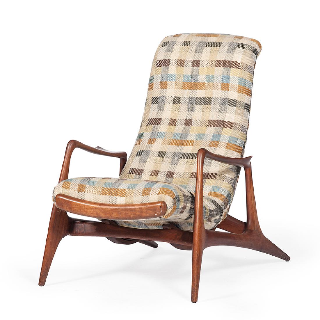 Vladimir Kagan Adjustable Lounge Chair: American, 20th century. A Vladimir Kagan adjustable contour lounge chair in walnut with a retractable footrest; ht. 39, wd. 27, dp. 40 in.