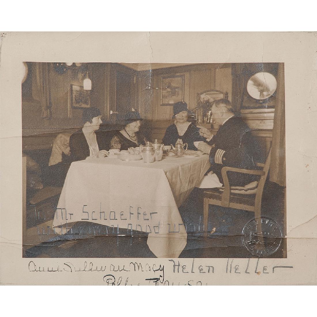 Helen Keller & Polly Thomson Signed Photograph: Keller, Helen (1880-1968). Signed silver gelatin photograph bearing the blindstamp of photographer W.D. Fink, US Lines, showing Helen Keller, Anne Sullivan Macy, and Polly Thomson pictured aboard the 