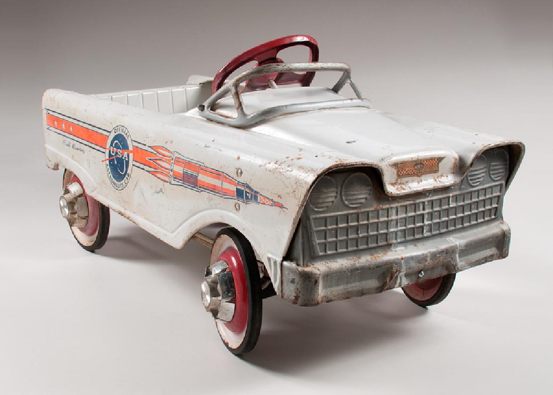 Murray Astronaut Pedal Car: American, 20th century. A toy pedal car by Murray with astronaut design, with logo on sides that says Official Astronauts Car USAÂ and Ball Bearing, and with Murray logo sticker on front bumper; ht.