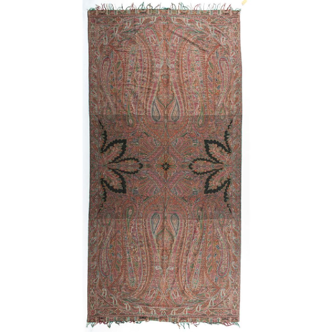 Victorian Paisley Textile: 19th-early 20th century. A polychrome paisley throw; 125.5 x 61 in.