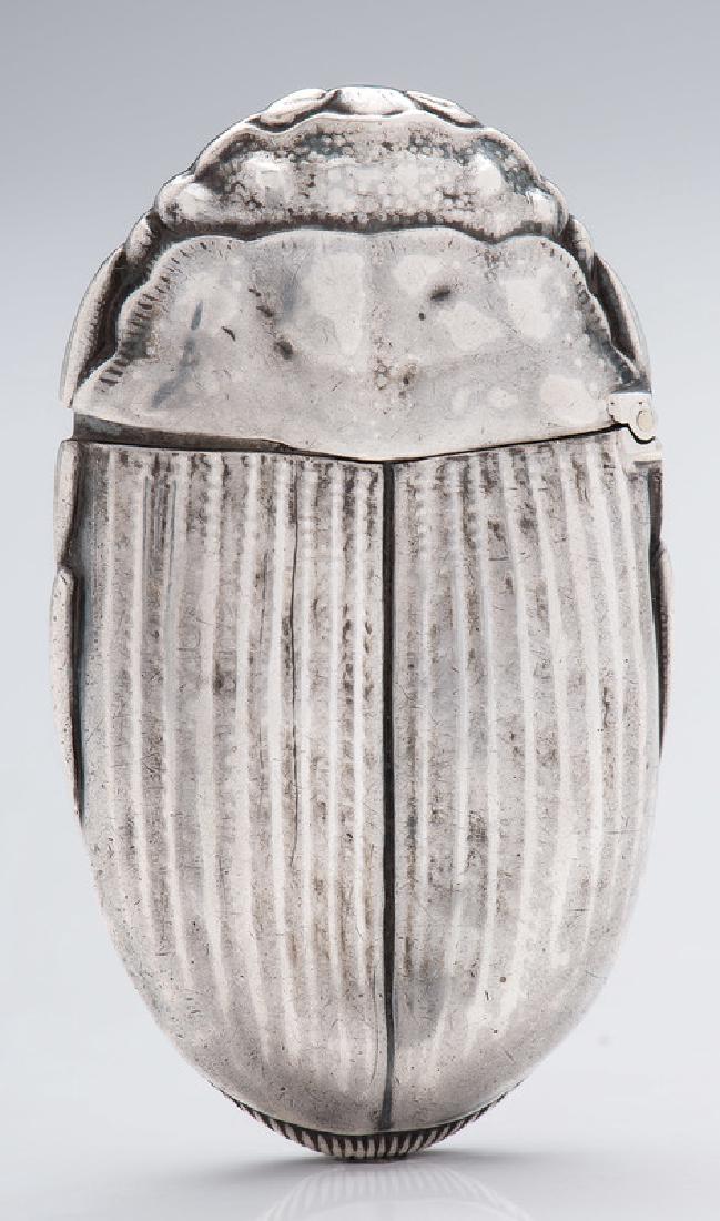 Rare Wallace Sterling Beetle Match Safe: American, late 19th century. AÂ WallaceÂ sterling silver match safe of a beetle with detailed repoussÃ© embellishments on the top and bottom, marked on interior rim; ht. 2 3/8 in., lg. 1 1/2 in.