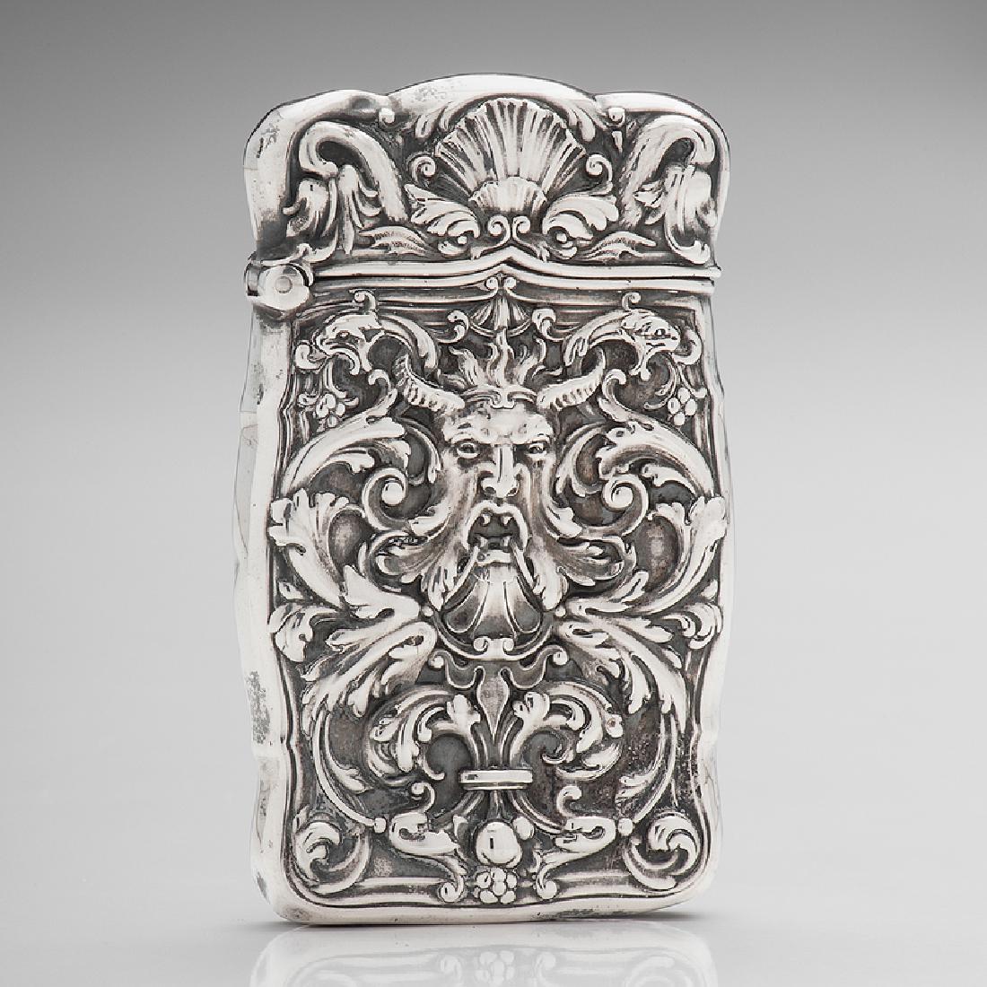 Gorham Sterling Match Safe with Grotesque Decoration: American, 1916. A sterling silver match safe by Gorham, the whole with repoussÃ©Â grotesque decoration including a horned mythological figure, monogrammed on back and marked on interior rim; ht. 2