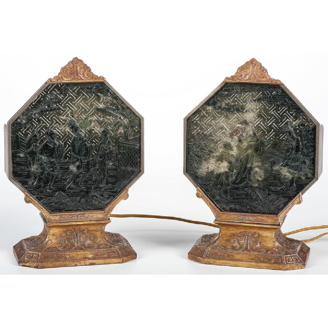 Chinese Backlit Spinach Jade Screens: Chinese. A pair of octagonal jade screens mounted on gilt backlit bases; ht. 14, wd. 9.25 in. (each).