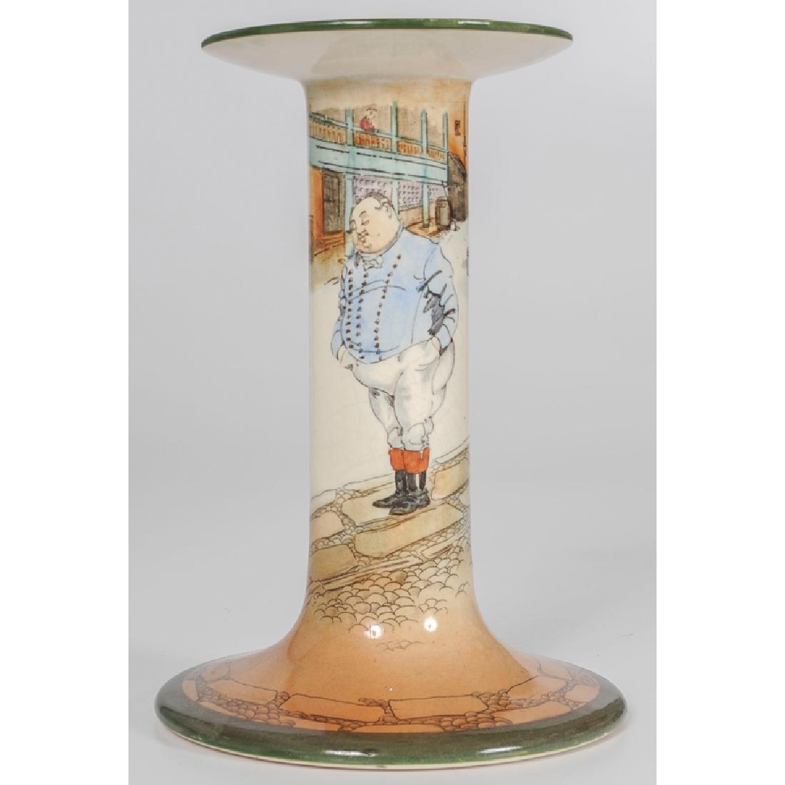 Royal Doulton Dickens, The Fat Boy Candlestick: English, early 20th century. A Fat Boy Dickens Ware candlestick by Royal Doulton; ht. 9 in.