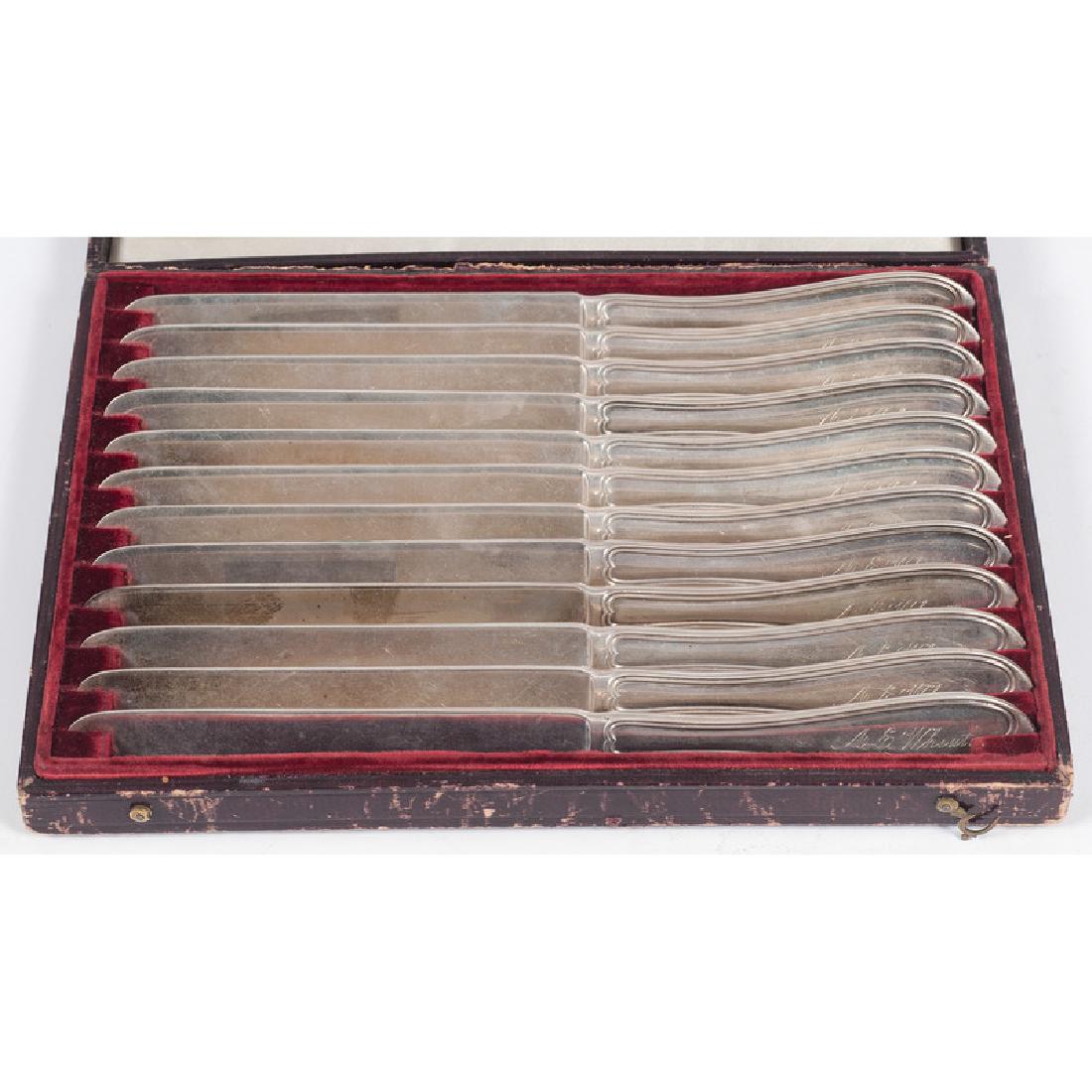 Cased Set of Gorham Coin Silver Butter Knives: American, 19th-20th century. A twelve piece set of Gorham coin silver butter knives in a fitted case. Each piece marked; case lg. 8.75 in., weighable silver wt. 23.67ozt (736g).