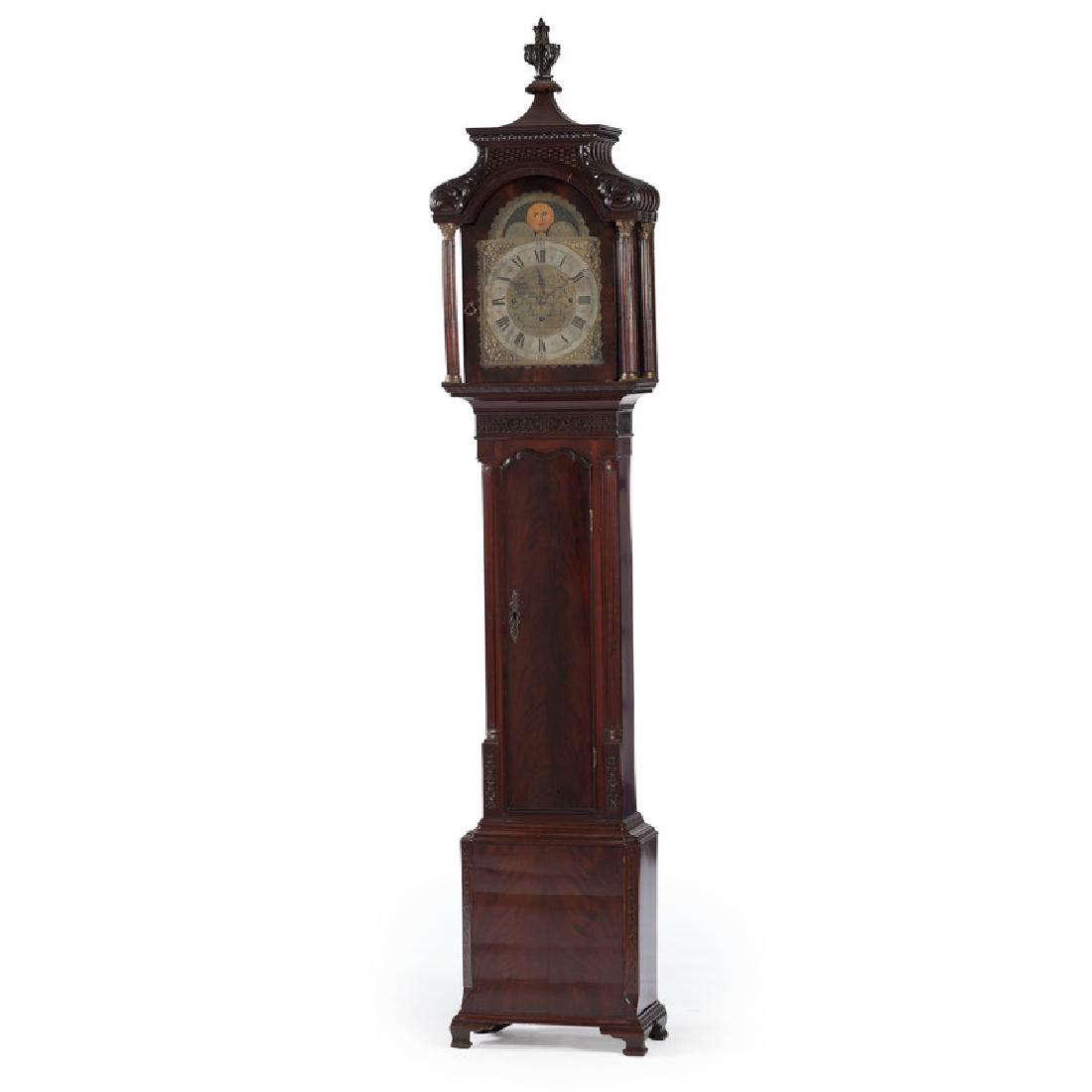 Chippendale Tall Case Clock by William Smith: English (London), ca 1770. A Chippendale tall case clock in mahogany, having a eight-day movement with secondary moon phase, silvered and brass dial signed W.M. Smith / Lancaster, bonnet top with a ce
