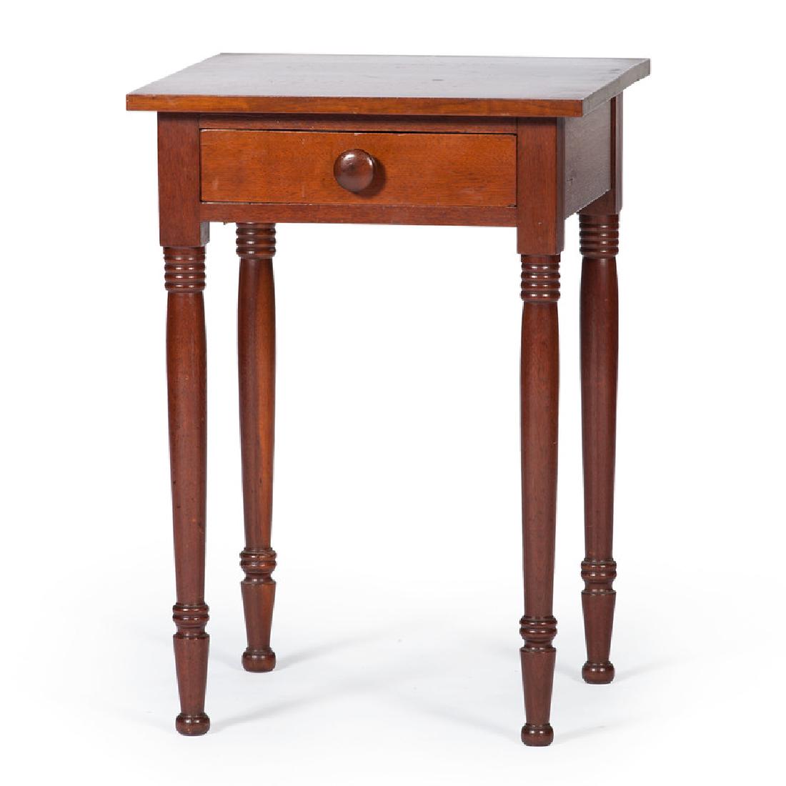 Walnut One Drawer Stand: American, 19th century. A one drawer stand in walnut, rising on ring turned legs and button feet; ht. 29, wd. 20.25, dp. 19 in.