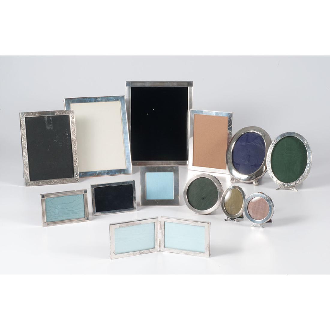 American Sterling Picture Frames Including Tiffany: American. A group of thirteen sterling silver picture frames by various makers including four by Tiffany & Co. in their original bags; largest frame 10 x 8 in.