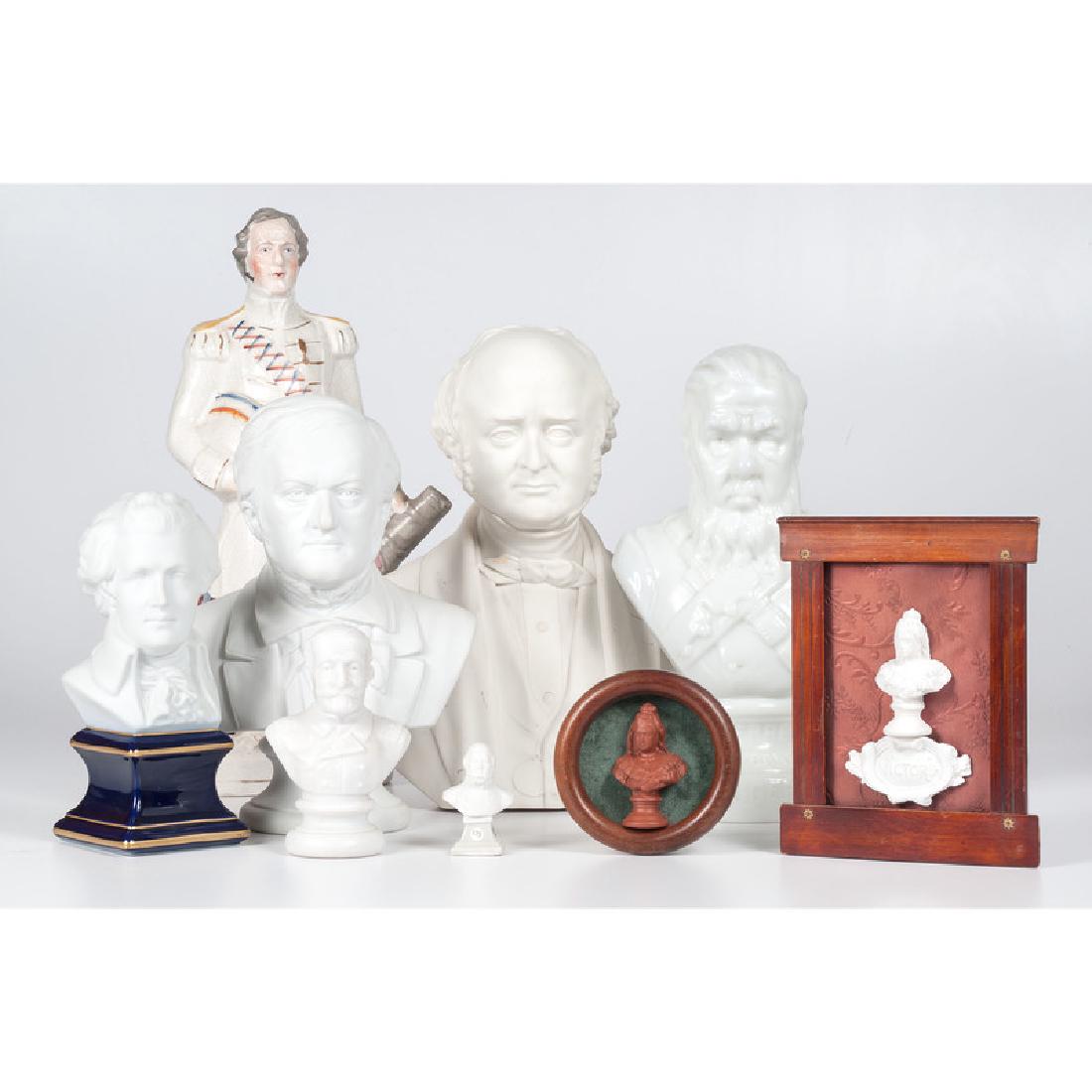 Parian Busts of Mozart and Other Continental Figures,: Continental. A group of five parian busts of varying size, including one of Mozart on a cobalt and gilt ceramic base, marked Limoges, France on underside, PLUS a Staffordshire naval officer figure