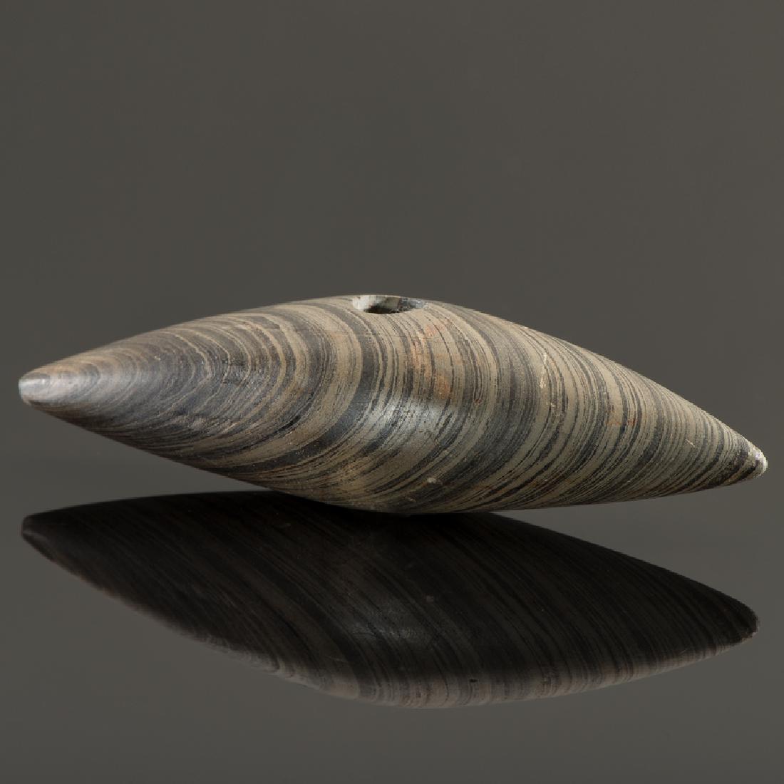 A Slate Pick Bannerstone, From the collection of Jan