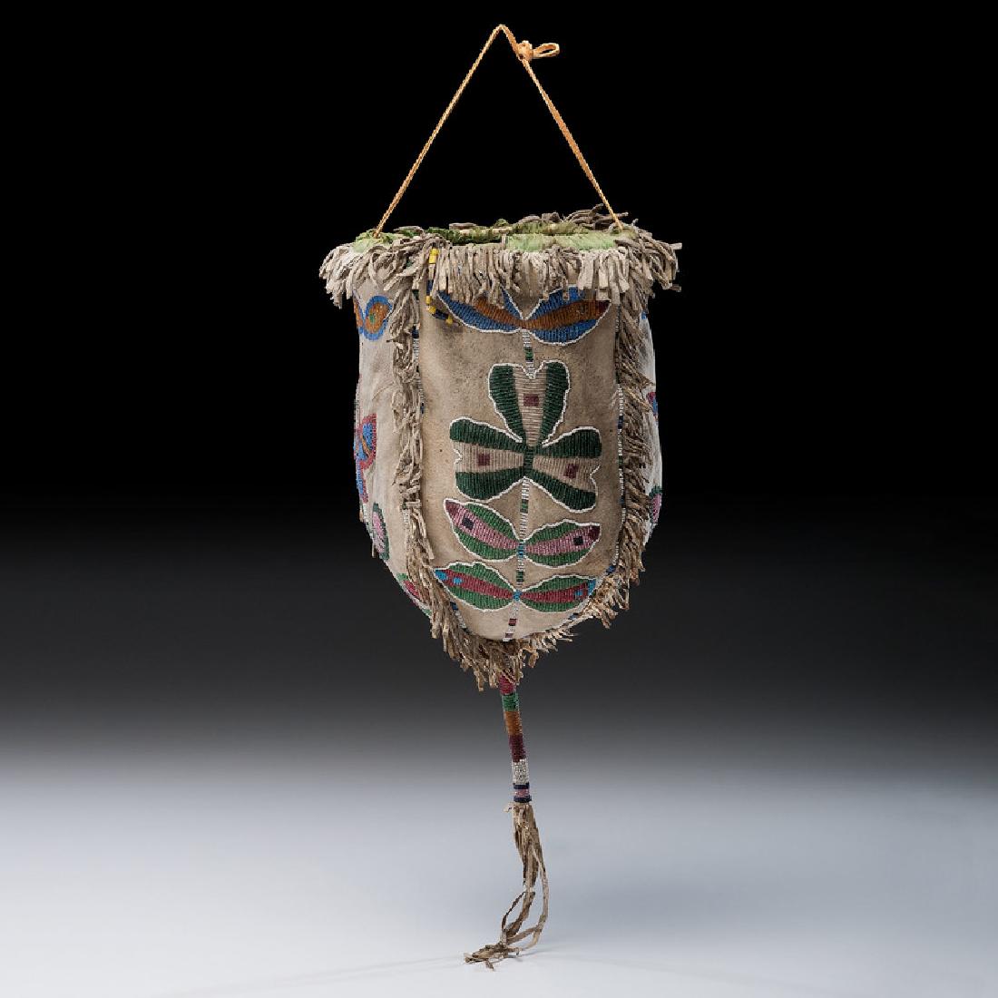 Eastern Plains Beaded Hide Four-Sided Pouch: four-sided hide pouch lined with cotton fabric; each side beaded with a vibrant floral design in colors of red white-heart, pea green, translucent green, greasy pink, periwinkle, cobalt, and transluce