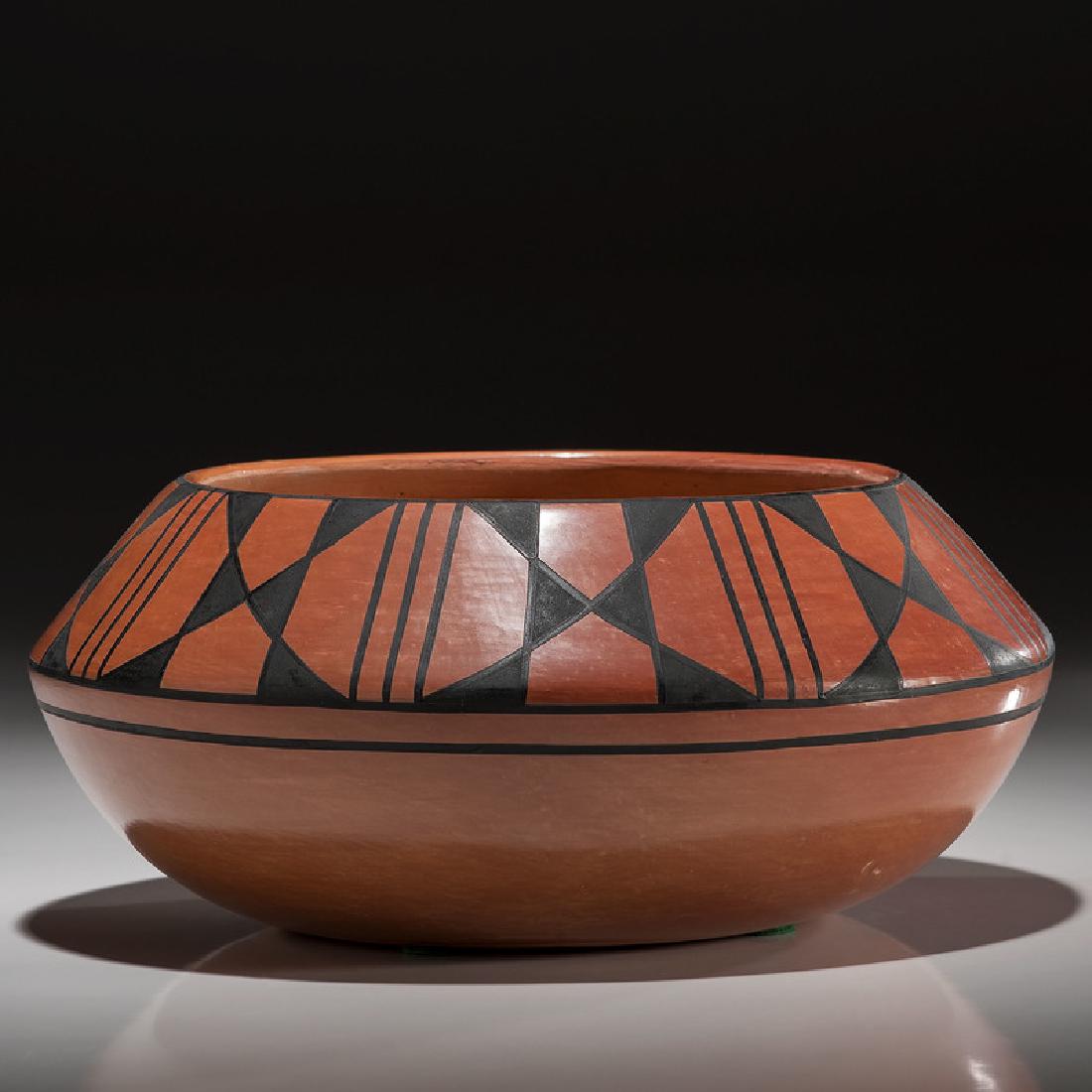 Crucita Calabaza, Blue Corn (San Ildefonso, 1921-1999): of bulbous form with geometric and linear elements painted in black above the shoulder; signed on base; height 5.5 in. x diameter 12.5 in.mid-20th century