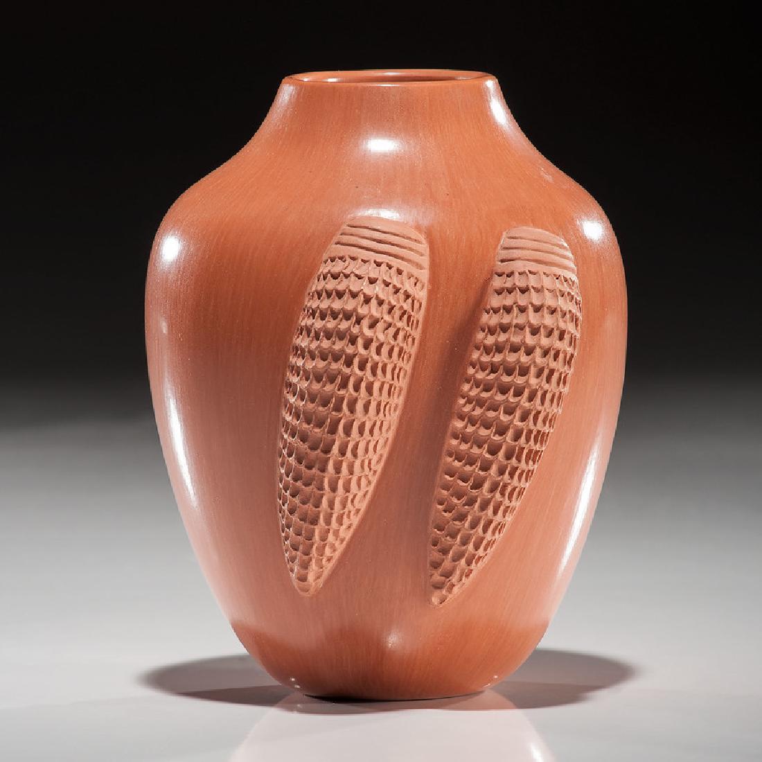 Al Qoyawayma (Hopi, b. 1938) Redware Pottery Jar: elegant form with two ears of corn applied to body; signed and dated on base, height 5.25 in. x diameter 4 in.1981