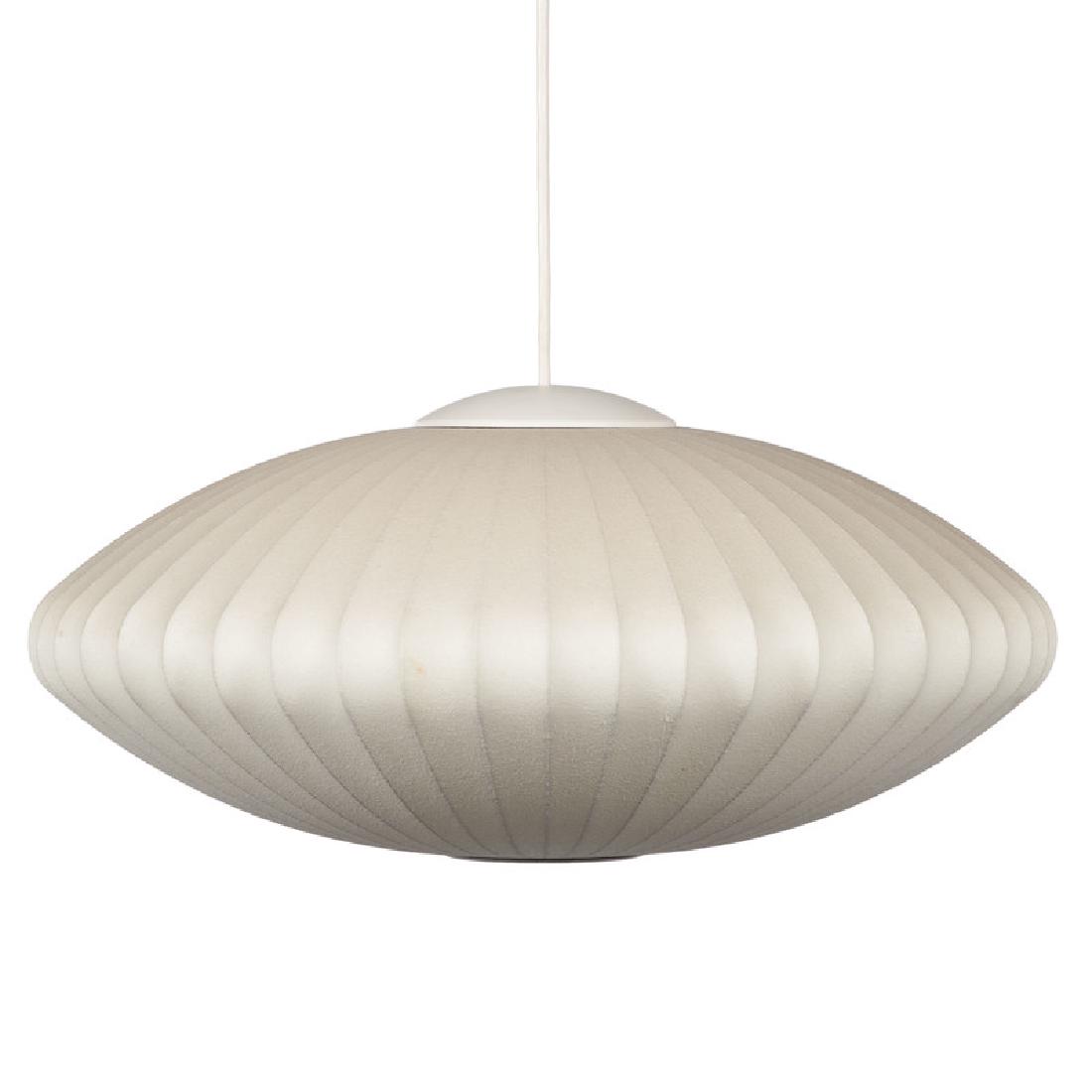 Mid-Century Modern George Nelson for Modernica Bubble: American, 20th century. An oval form hanging lamp made of fiberglass over metal frame, with Modernica label; ht. 10.25 in. (not including wire), dia. 25.25 in.