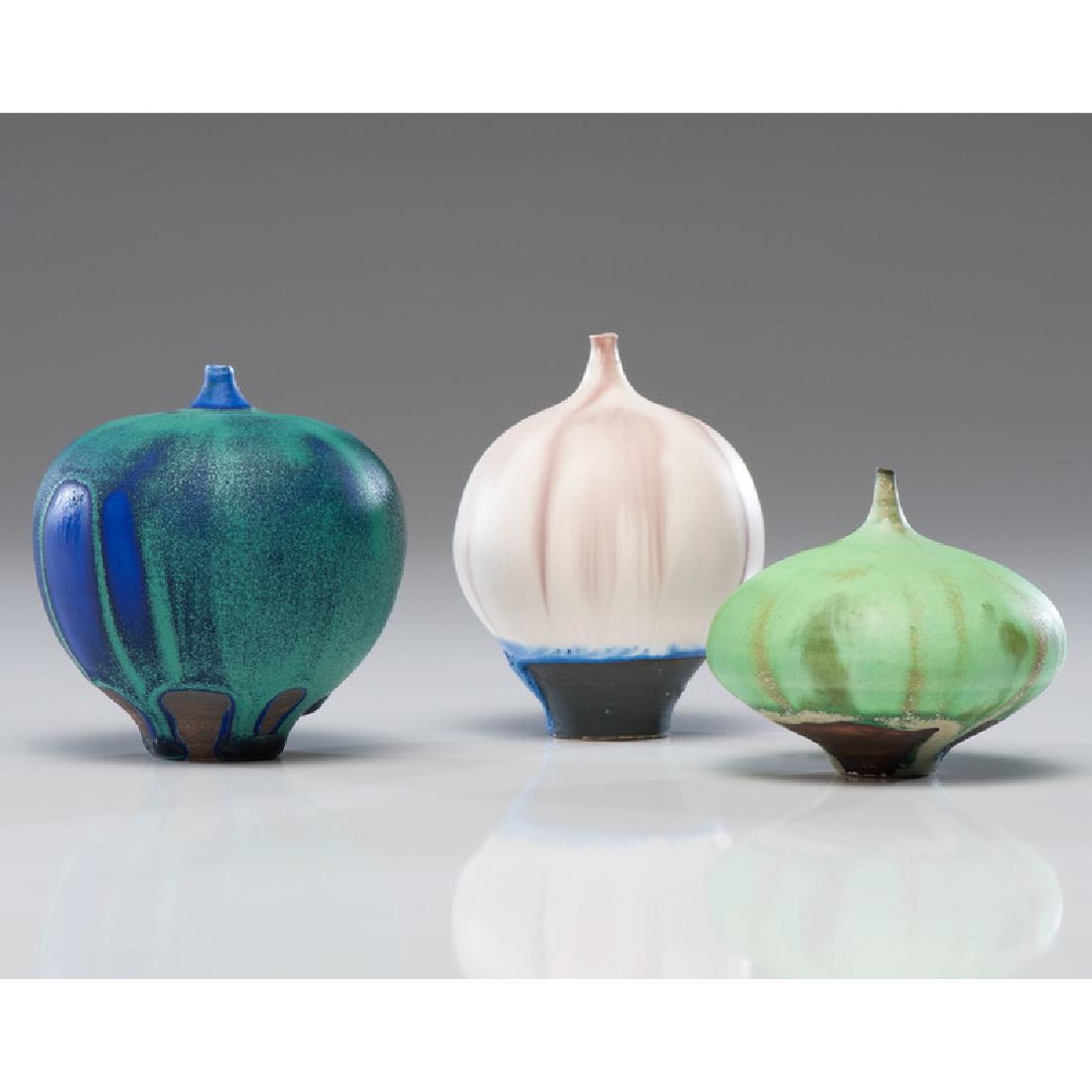 Rose Cabat (American, 1914-2015): Three Feelies glazed porcelain each with artist signature on base tallest 4.75, dia, 2.5 in. Rose Cabat and her husband Erni began developing their own glaze formulas after taking a glaze course i