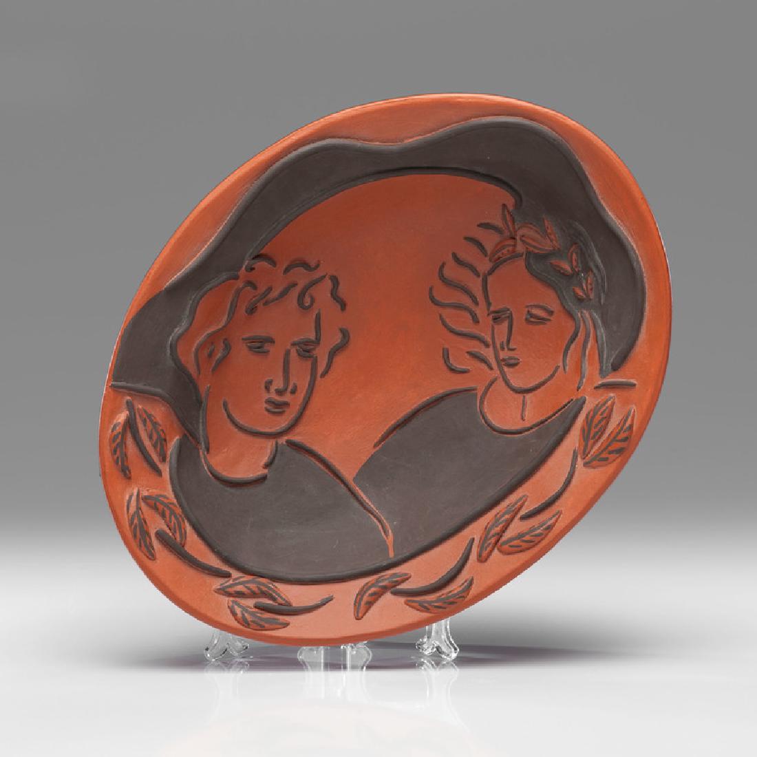 Andrea Gill (American, b. 1948): Oval Bowl with Two Faces stoneware artist signature and dated 1996 on base ht. 4.25, wd. 16, dp. 12.5 in.