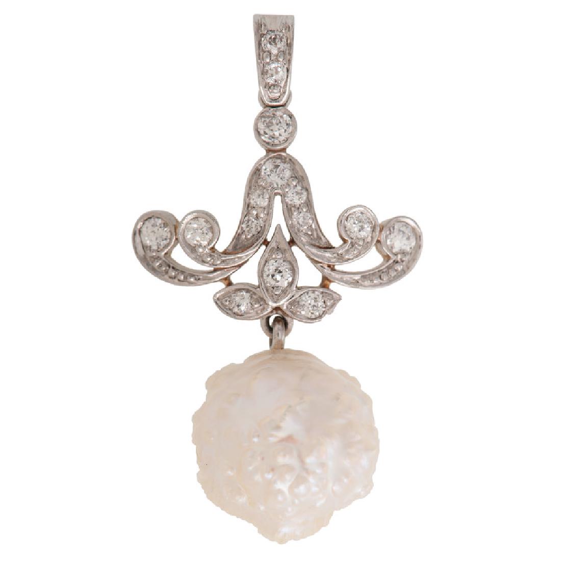 Platinum Over 18 Karat Gold Edwardian Diamond and Pearl: Containing fifteen old cut diamonds weighing approximately 0.35 carat total, with a pearl drop measuring approximately 13.7mm. 1.5" L x 0.75" W. 3.5 dwt.