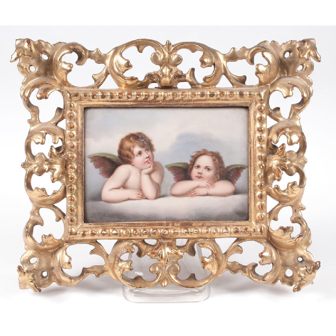 Cupids Porcelain Plaque, After Raphael: 20th century. A painted porcelain plaque decorated with two Cupids, after Rapahel's Sistine Madonna, unmarked, numbered 48 on reverse, with pencil inscriptions u.l., housed in an ornate carved gilt