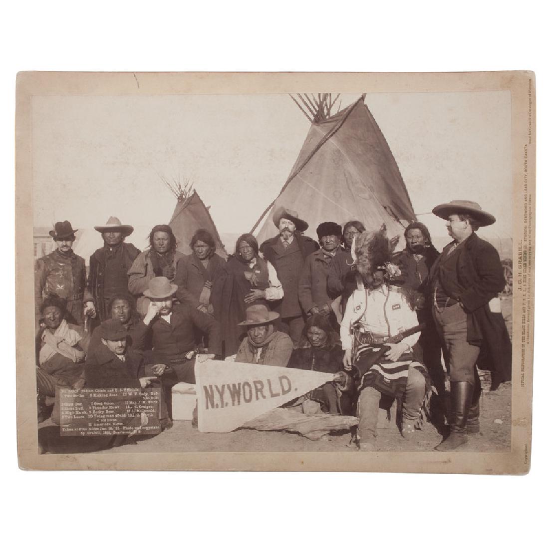 Indian Chiefs and US Officials, Incl. William F. Cody,: Photograph, 9.75 x 12.75 in., on Grabill's Deadwood, SD, gilt-imprinted mount, titled in the negative "No. 3630 - Indian Chiefs and U.S. Officials / Taken at Pine Ridge Jan. 16, '91. Photo and co