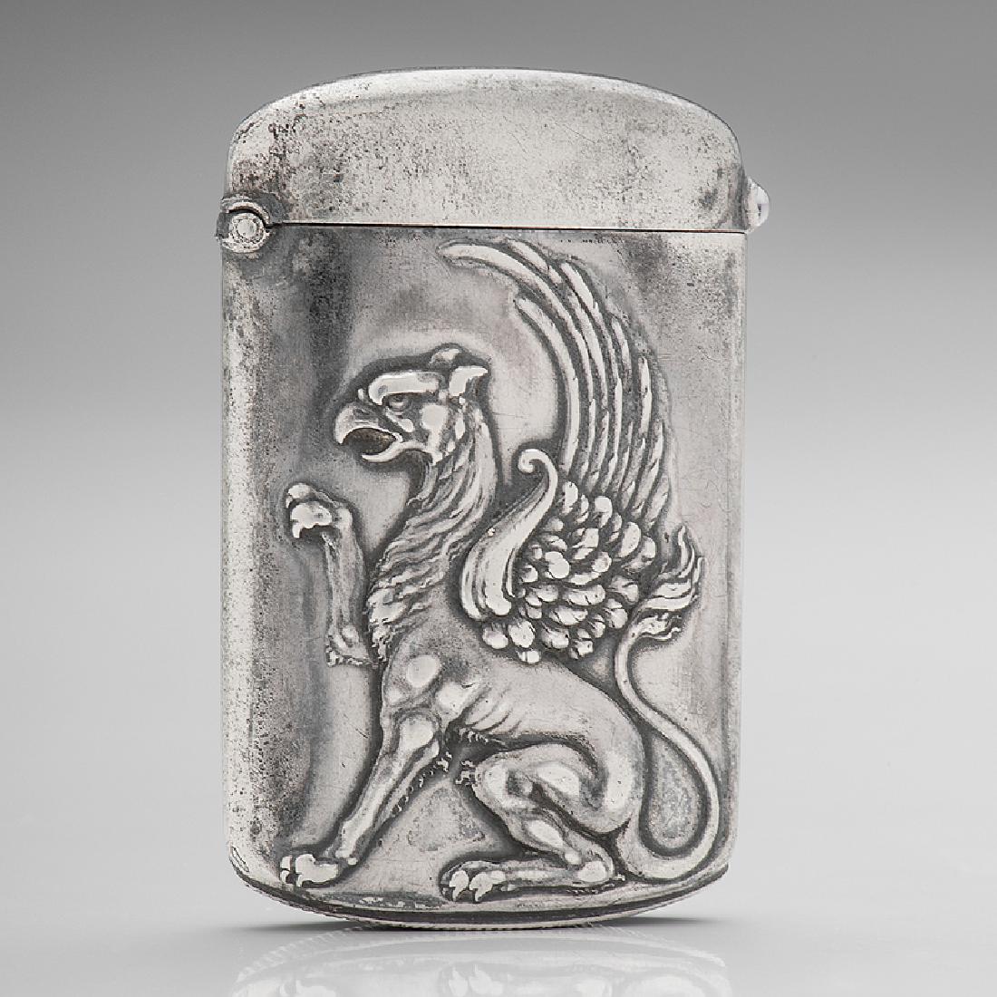 Sterling Match Safe with Griffin Decoration: American, late 19th-early 20th century. A sterling match safe with a griffin decoration and sapphire-colored glass push, marked sterling on interior; ht. 2 3/8, wd. 1 5/8 in.