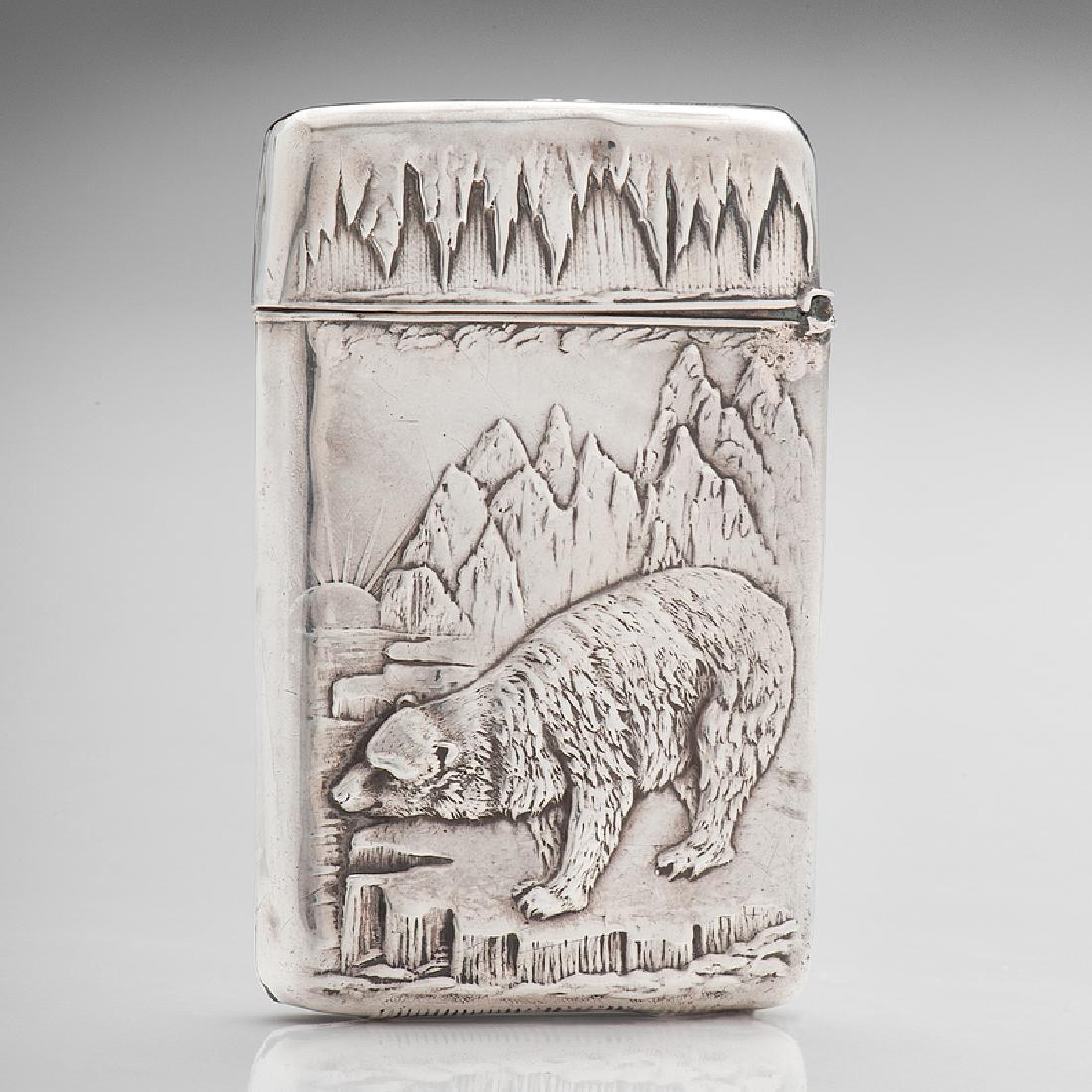 Rare Sterling Match Safe with Polar Bear on Ice: American, late 19th-early 20th century. A rare sterling match safe with the same design on both sides of a large polar bear standing on ice with peaks in the background, the sun at the horizon, mark