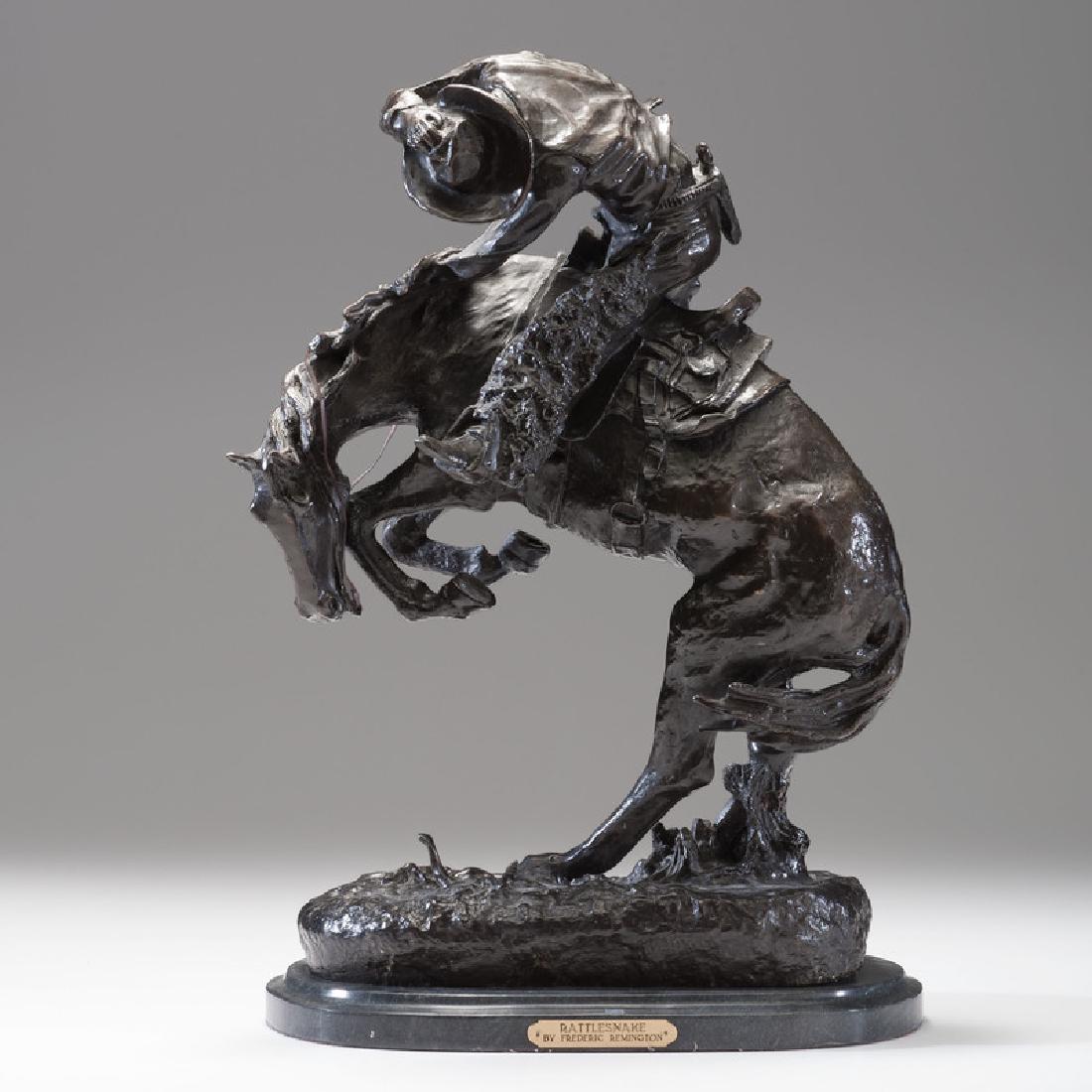 After Frederic Remington (American, 1861-1909): Rattlesnake bronze recast raised on marble pedestal signed on base oah. 23.25, wd. 16 in.